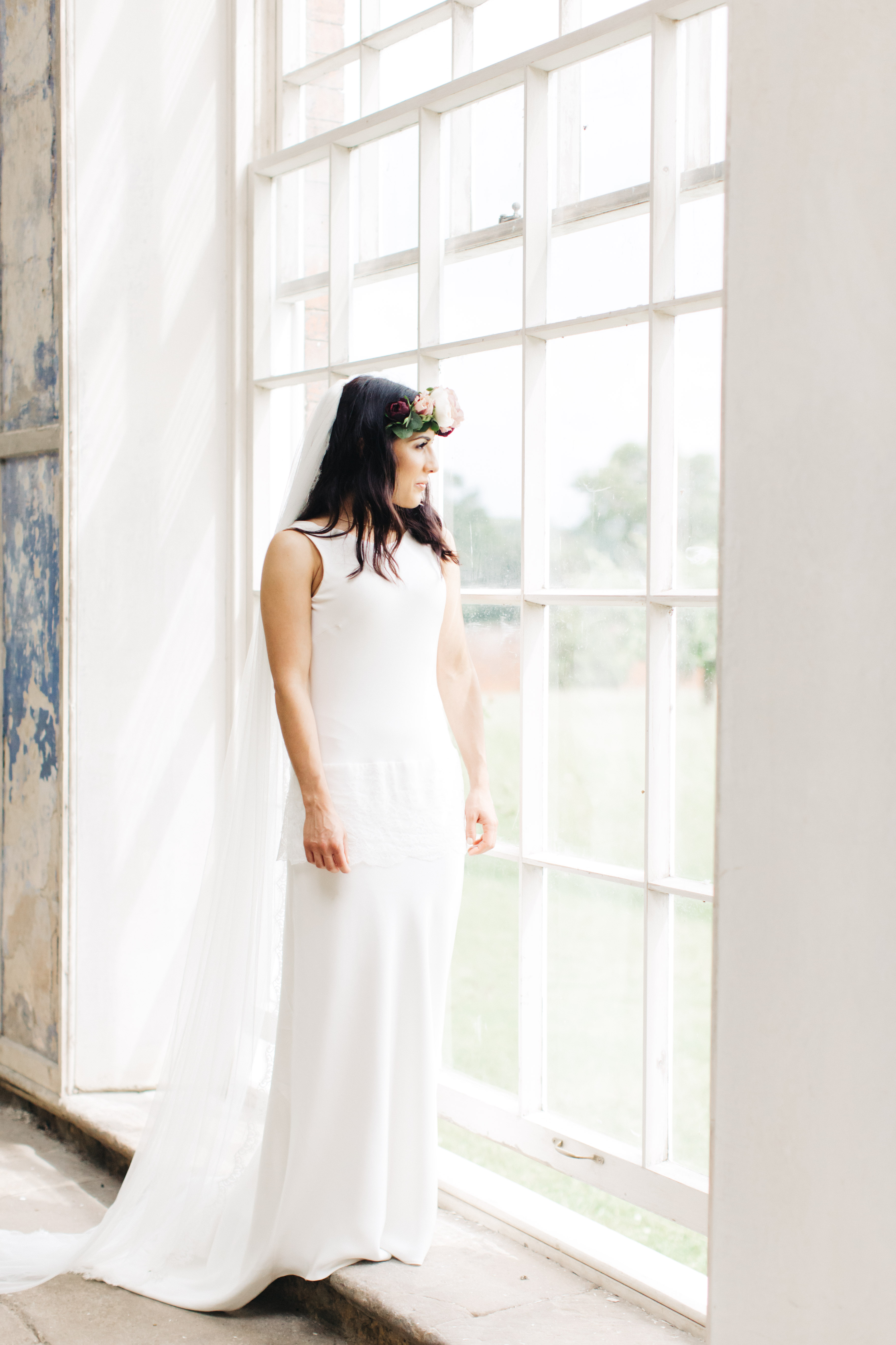 Real Bride Giulia wears Sada by Charlie Brear - bride window image
